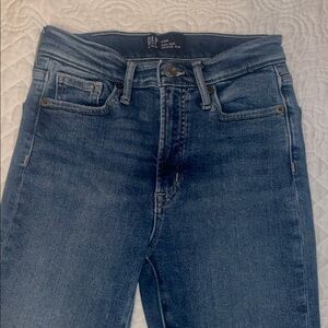 GAP Denim High Rise Vintage Slim Jeans - Blue. Size 0. Rough hem.